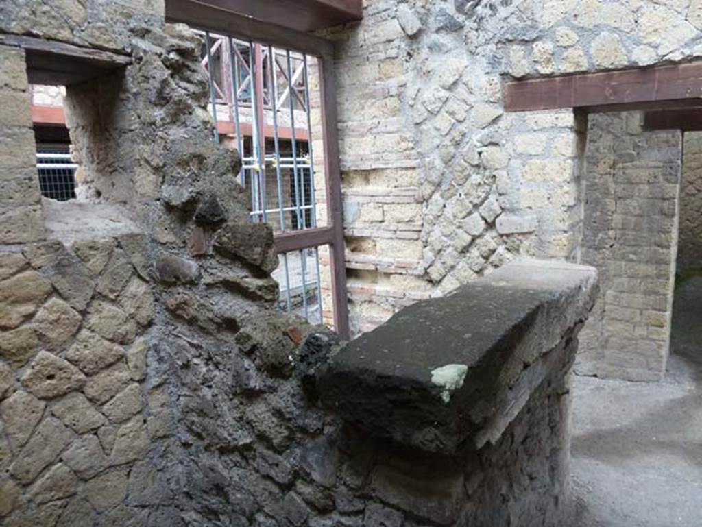 IV.4 Herculaneum. September 2015.
Room 2, looking north-west. The doorway, left of centre, is the doorway leading to the steps to the upper floor at IV.3.